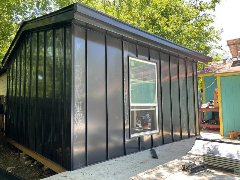 Black standing seam metal wall panels for Roof Inspection in Lucerne Valley
